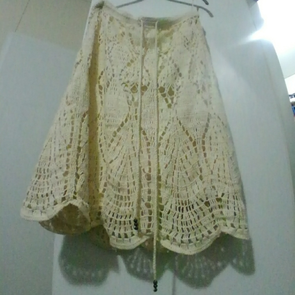 A very cream/beige skirt